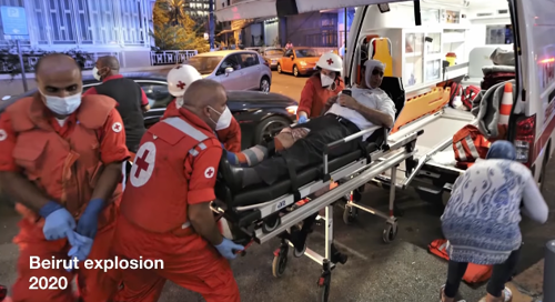 Red Cross - paramedics taking a casulty into an ambulance in Beirut